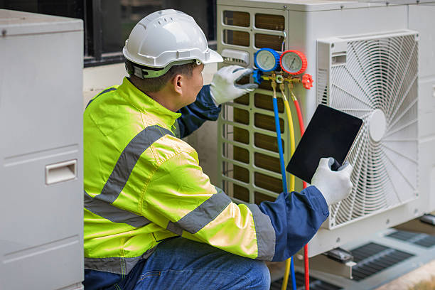 Professional Heat Pump Repair technician working in Yalaha, FL